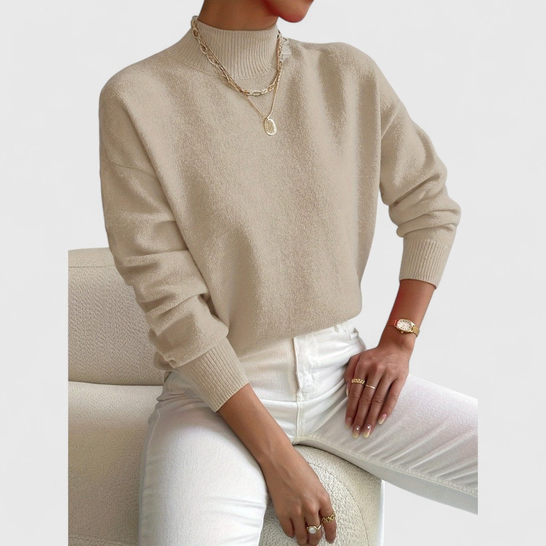 Women's cream turtleneck knit sweater, smooth ribbed texture, elegant office-ready slim fit