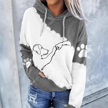 Gray relaxed fit hoodie with hand-and-dog outline paw print graphic for dog lovers