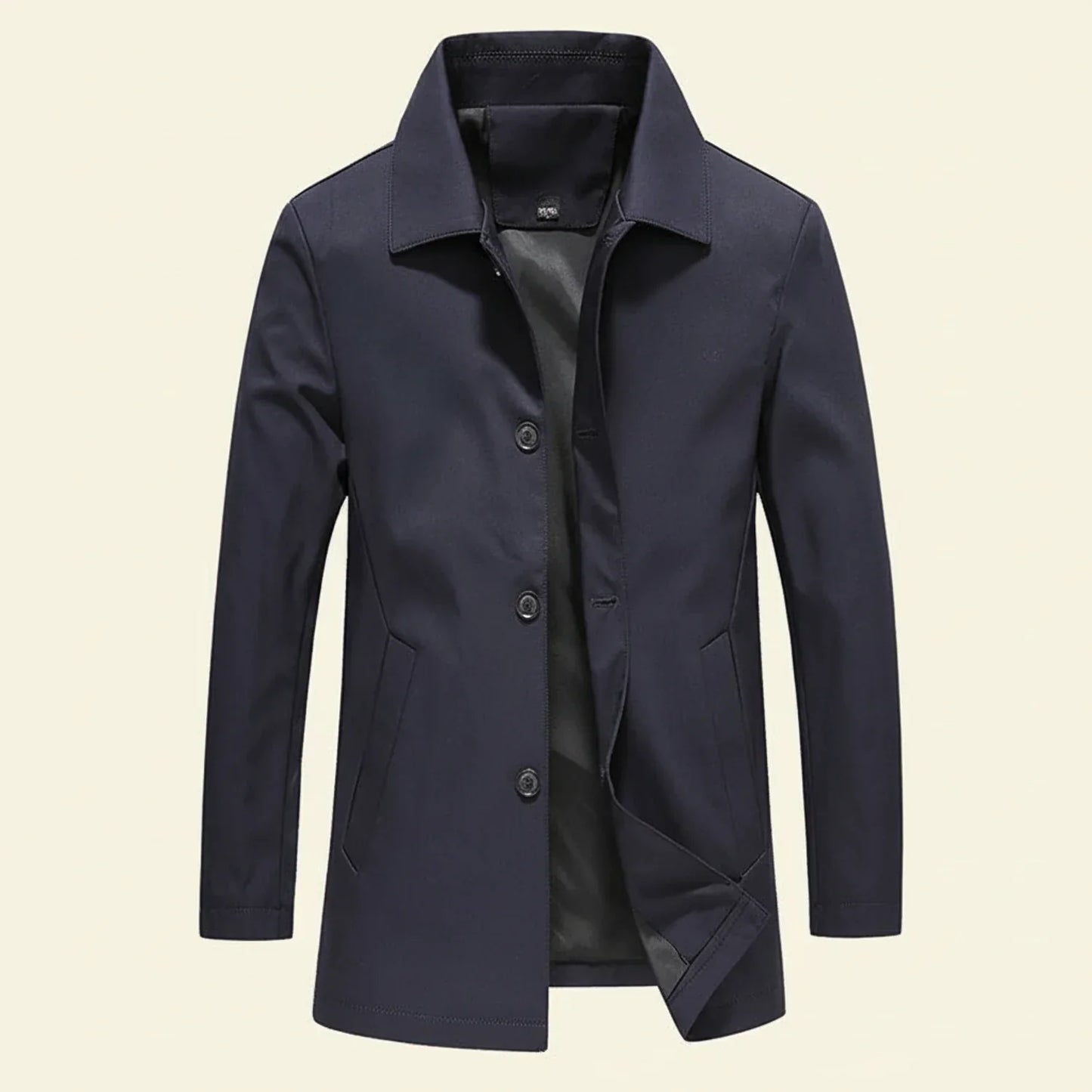 Men's minimalist mid-length overcoat in neutral tone with button-down front closure