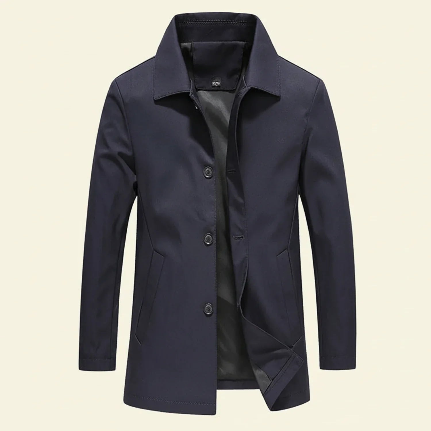 Men's minimalist mid-length overcoat in neutral tone with button-down front closure