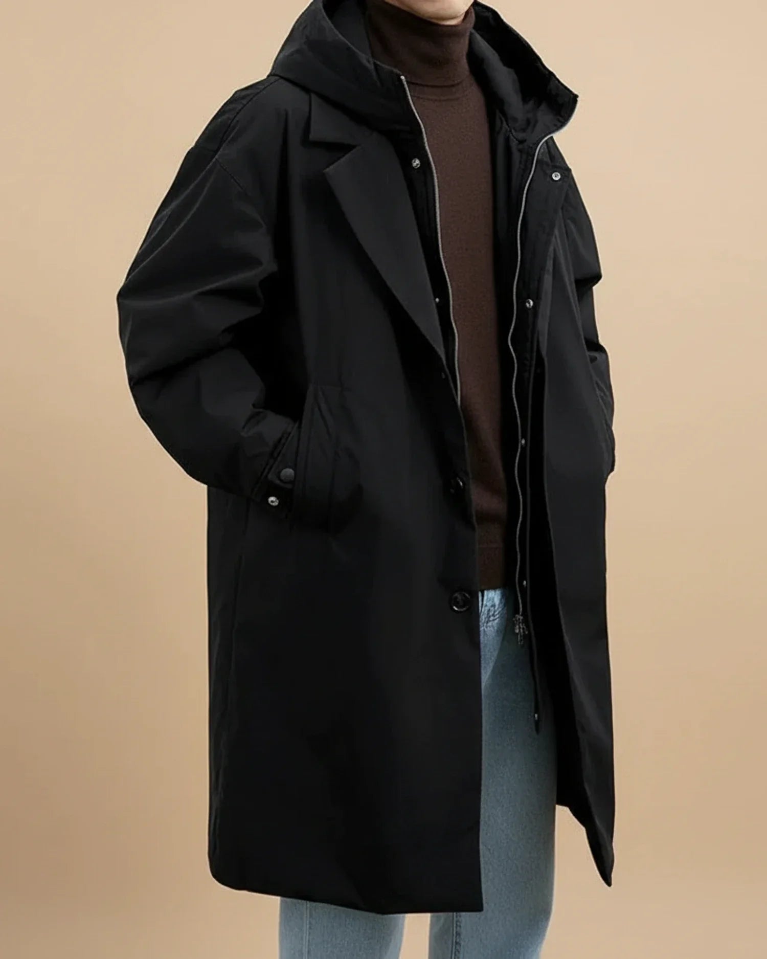 Men's olive green oversized waterproof hooded overcoat with zip-front closure for urban style