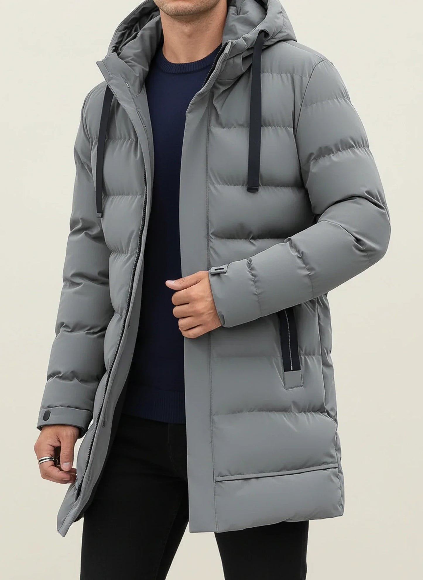 Men's black hooded longline puffer jacket insulated winter coat with zip front and adjustable cuffs