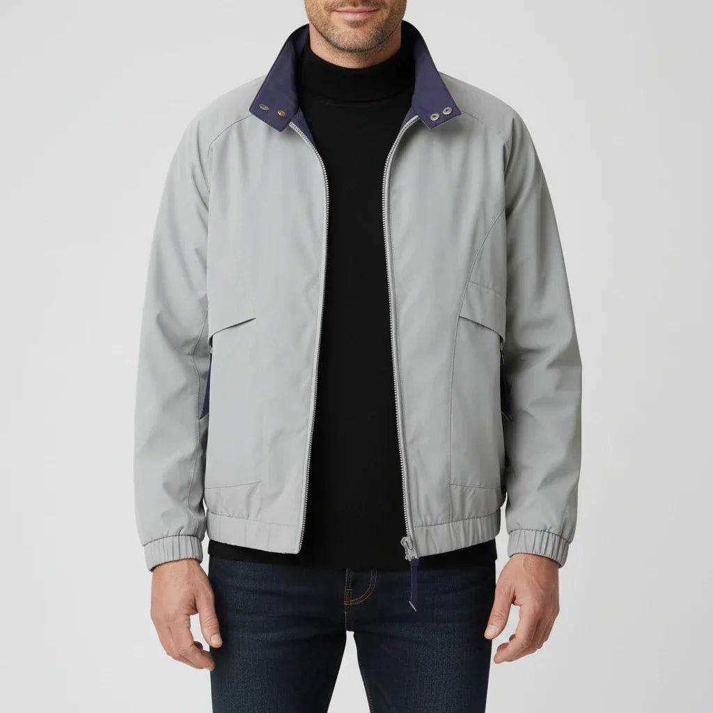 Men's lightweight windbreaker jacket with stand collar, zip-up closure, and welt pockets in bomber silhouette