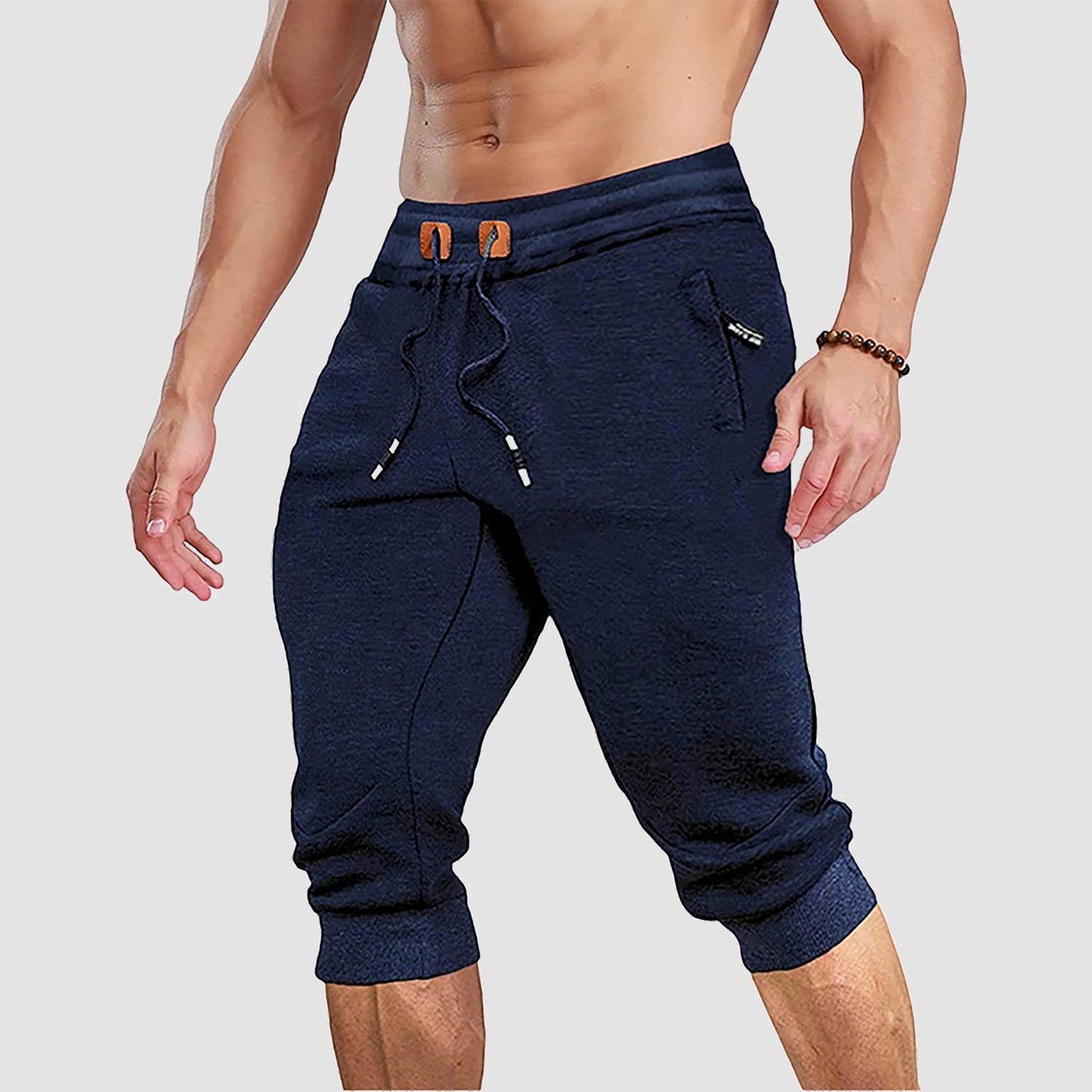 Men's 3/4 capri joggers with side pockets, breathable cotton-poly-spandex blend for active summer wear