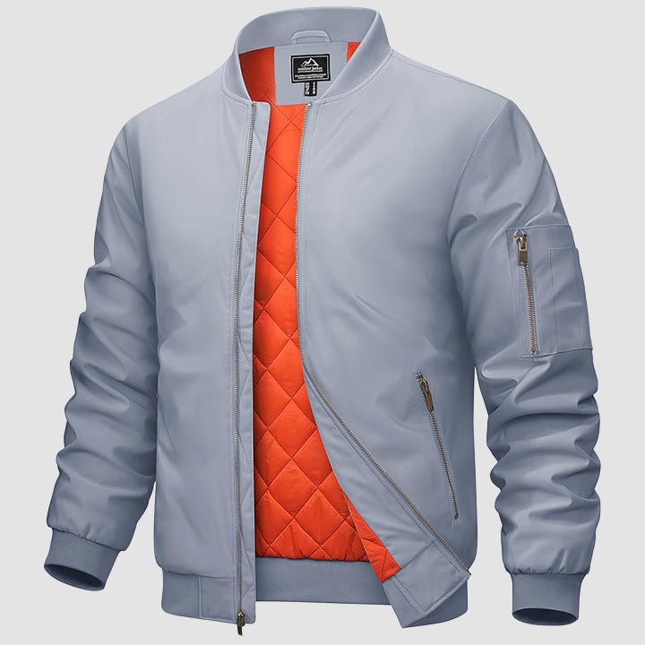 Men's black bomber jacket zip-up windbreaker with quilted orange interior lining and multi-pocket design