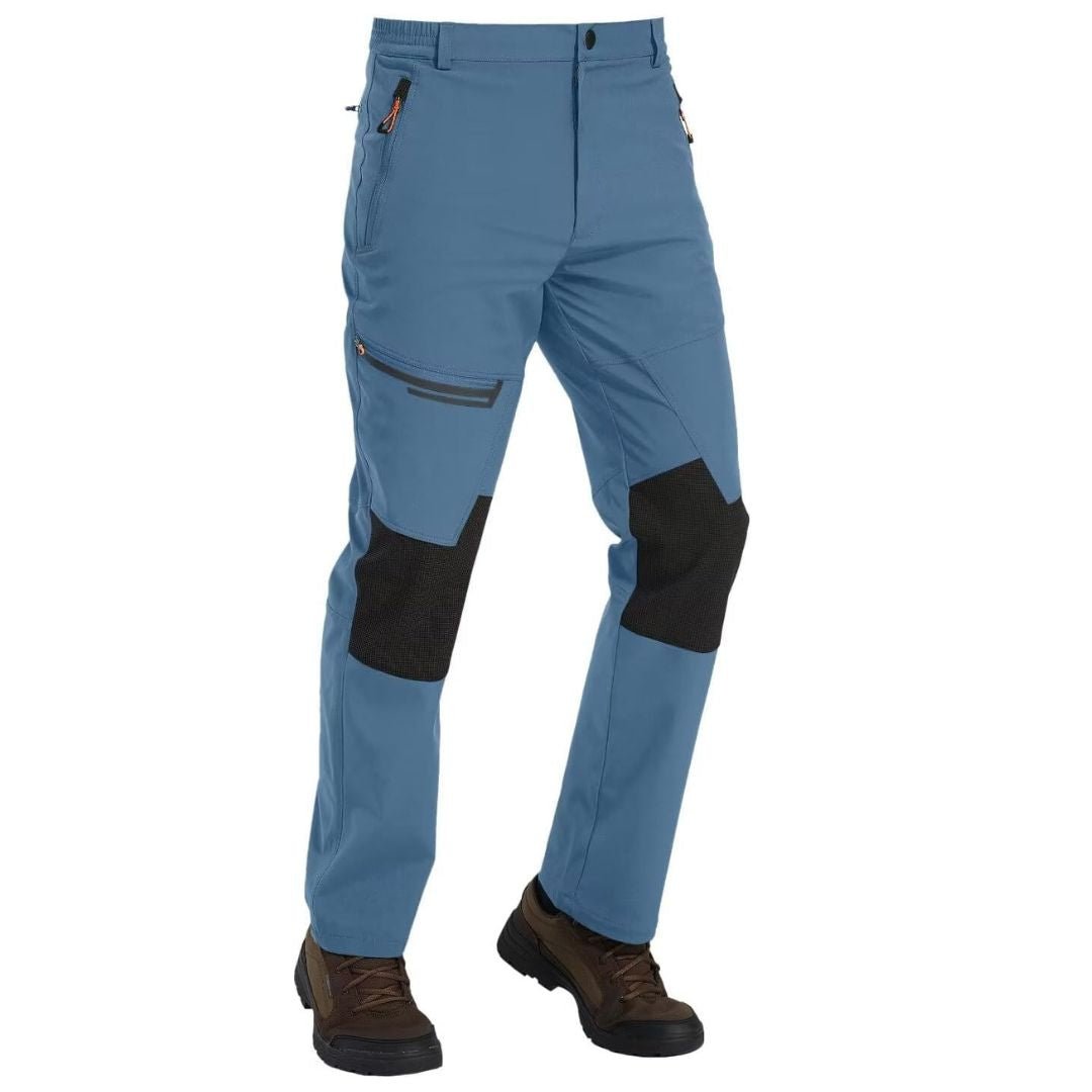 Men's fleece lined windproof ski pants for winter sports with water resistant shell