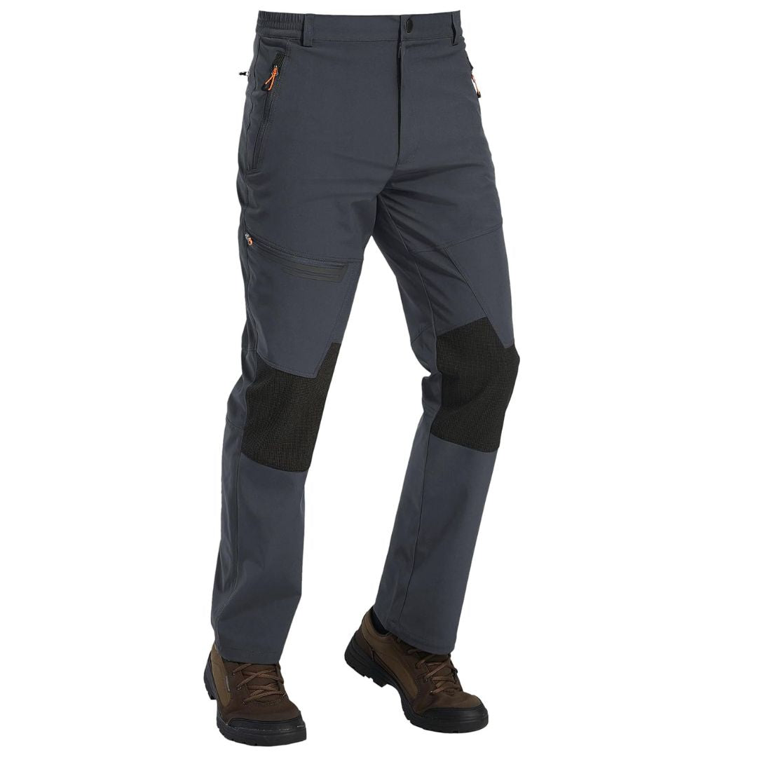 Men's fleece lined windproof ski pants for winter sports with water resistant shell
