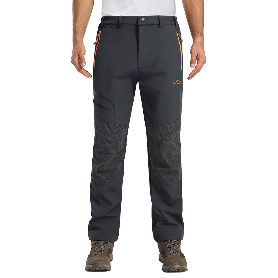 Men's black windproof soft shell hiking pants with fleece lining and water-repellent stretch fabric