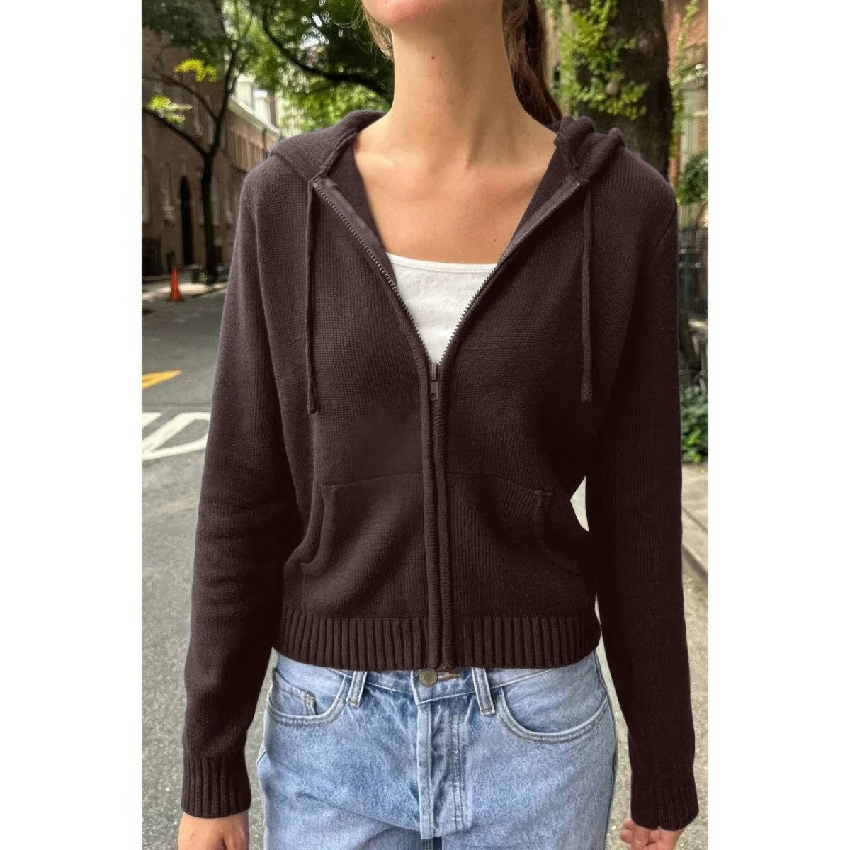 Women's solid ribbed knit hoodie with front zipper pockets, lightweight polyester in casual fit