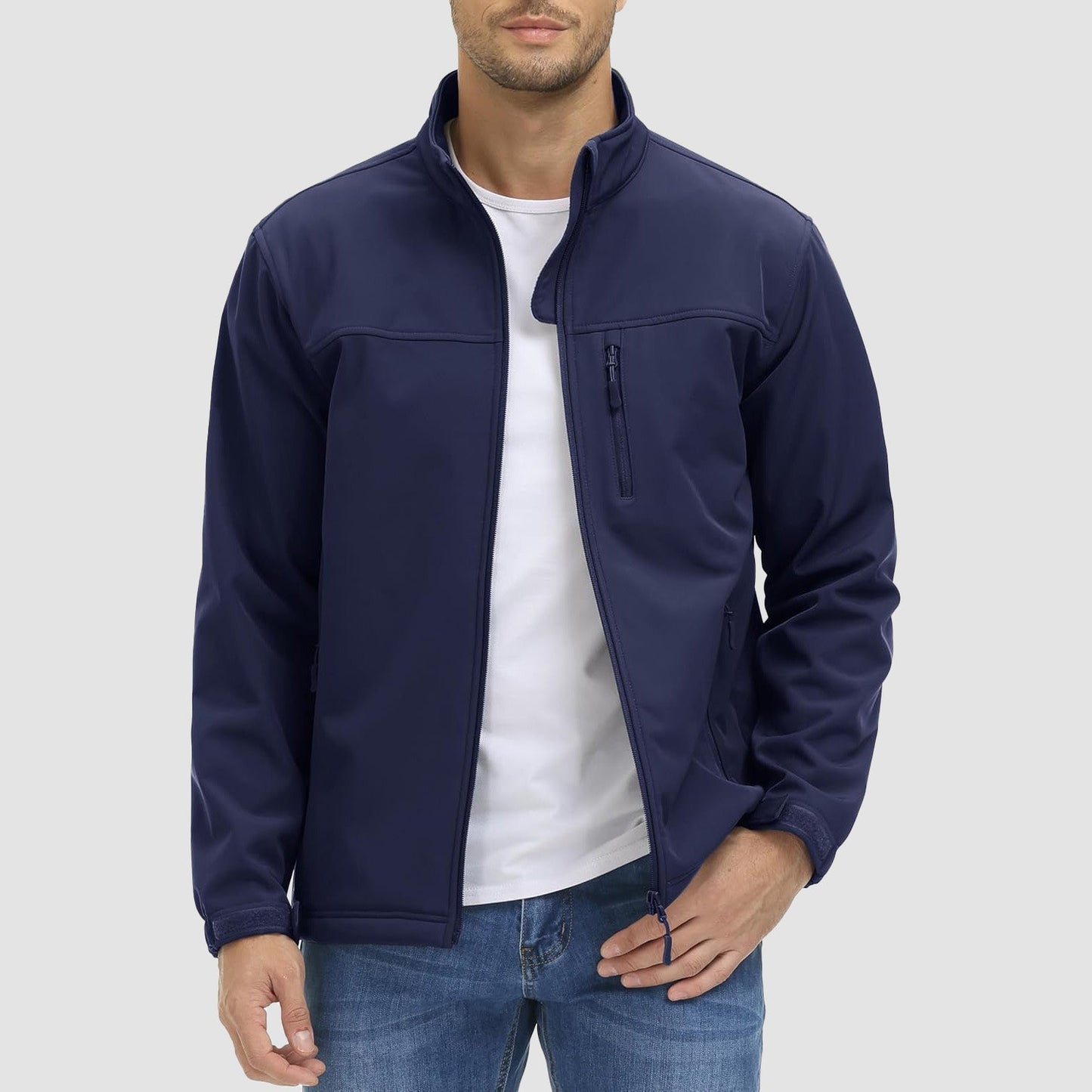 Men's tactical softshell winter jacket with fleece lining, stretch fit, and abrasion-resistant panels