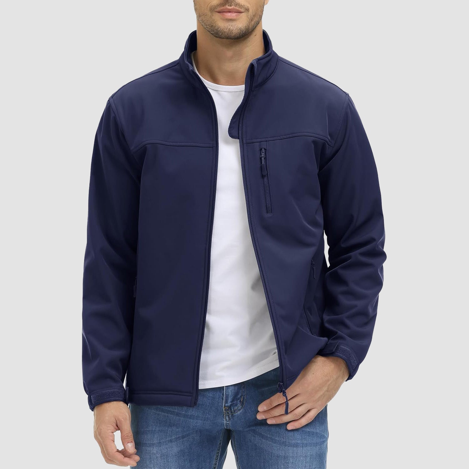 Men's tactical softshell winter jacket with fleece lining, stretch fit, and abrasion-resistant panels