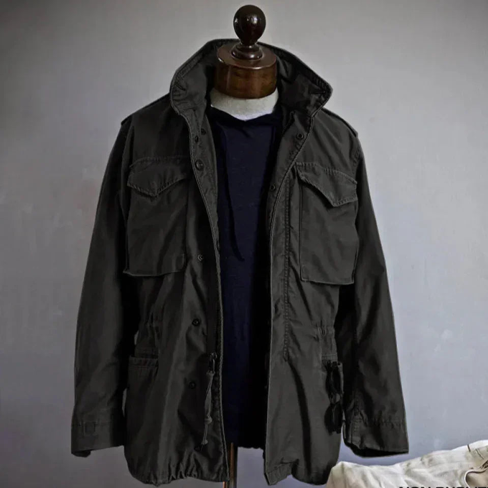 Men's vintage cotton field jacket in olive green with adjustable waist and classic outdoor tailored fit