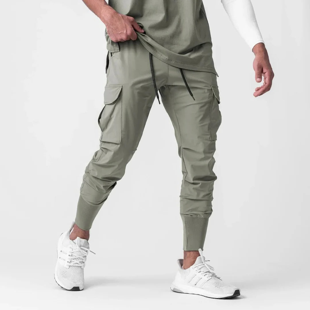 Black lightweight cargo joggers with tapered fit and multi-pocket utility design for active wear