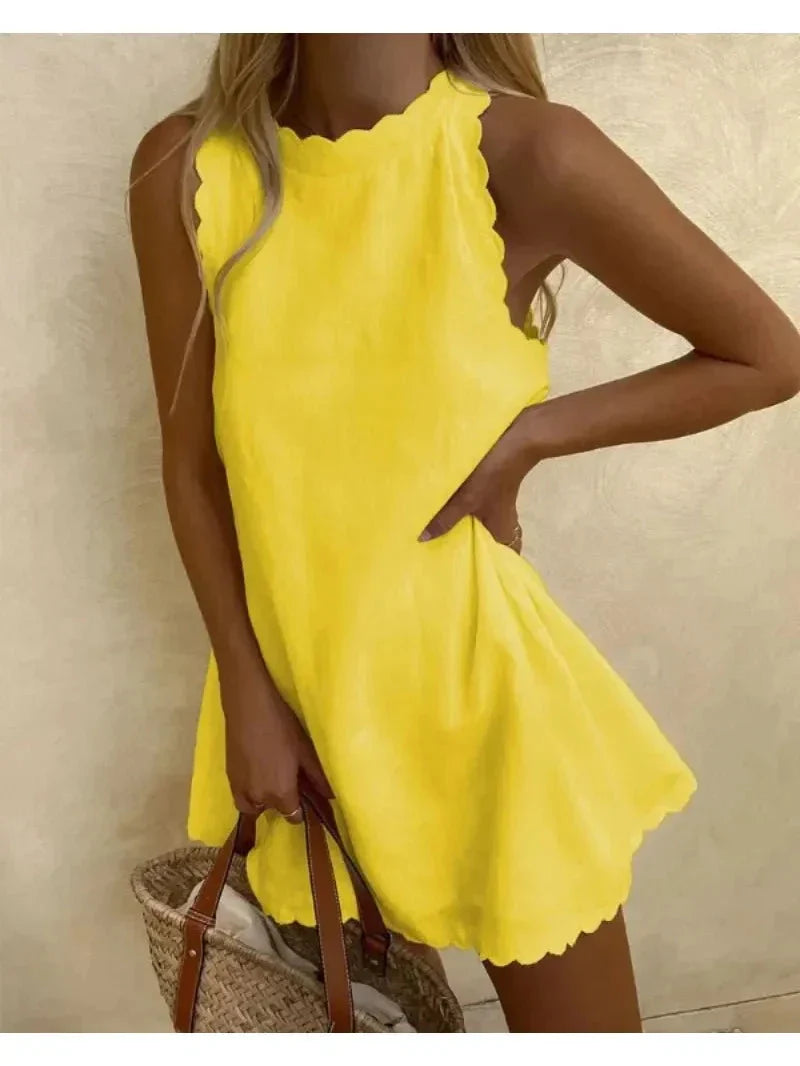 Yellow mini A-line casual elegant dress with wavy trim, lightweight breezy fabric for sunny days
