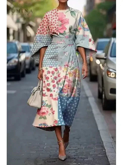 Women's elegant floral midi dress with flowing silhouette and delicate all-day comfortable feminine fit