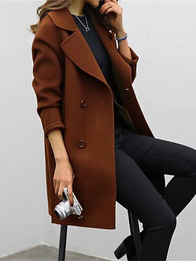 Women's long double-breasted winter coat in classic style with statement button front closure