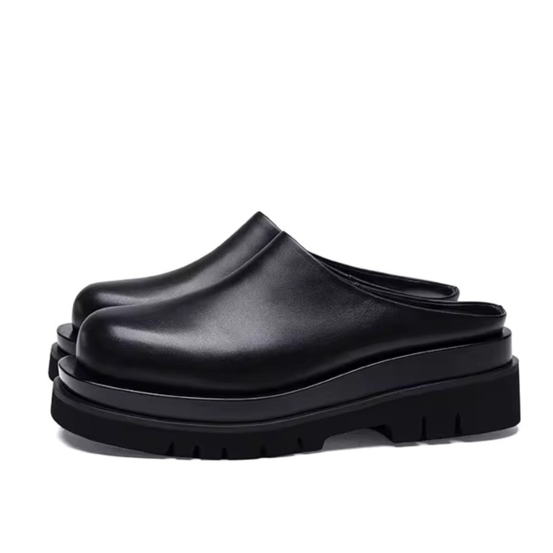 Melo black leather platform mules bold chunky sole slip-on urban casual modern silhouette