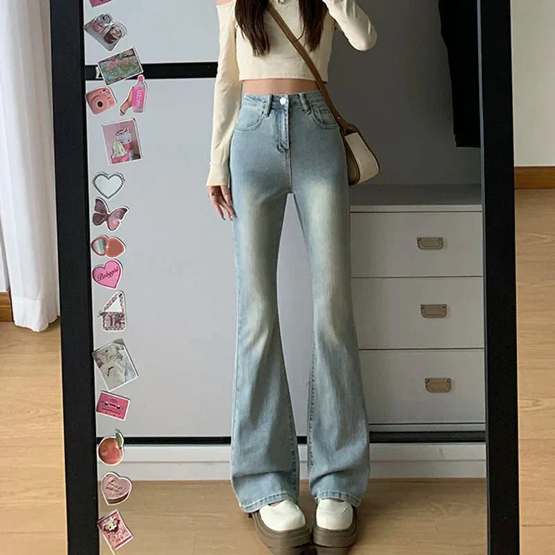 Women's high-waist flared jeans in classic blue denim with a comfortable cotton blend everyday fit