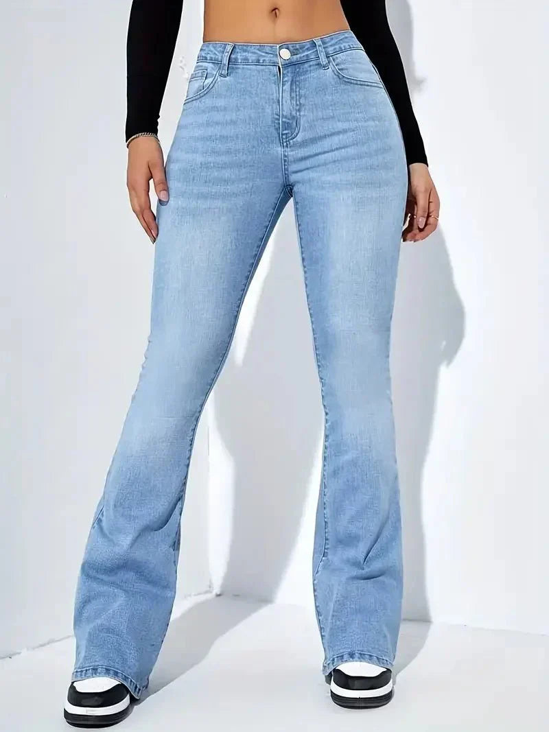 Women's high-waist flared denim jeans in classic blue cotton blend with retro wide-leg silhouette