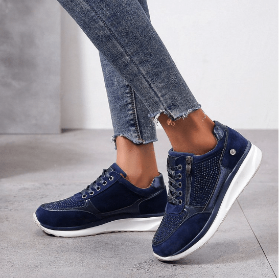 Women's cushioned wedge sneakers in neutral tones, stylish everyday comfort with elevated wedge sole