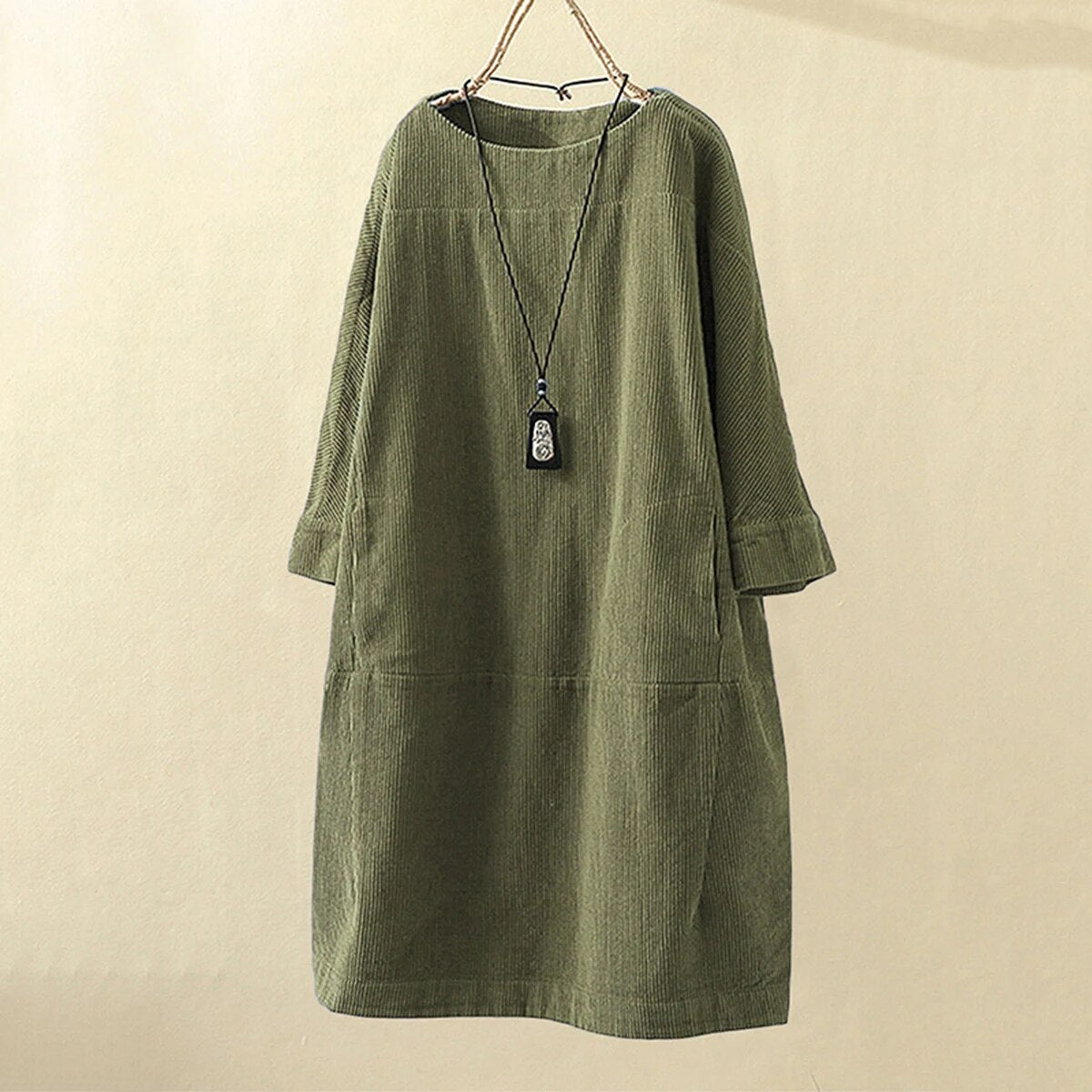 Women's brown corduroy loose fit knee-length dress with round neck and long sleeves