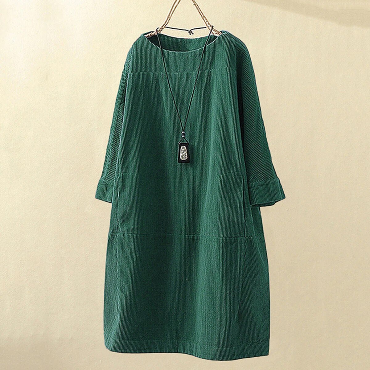 Women's burgundy corduroy loose fit knee-length dress with round neck and long sleeves