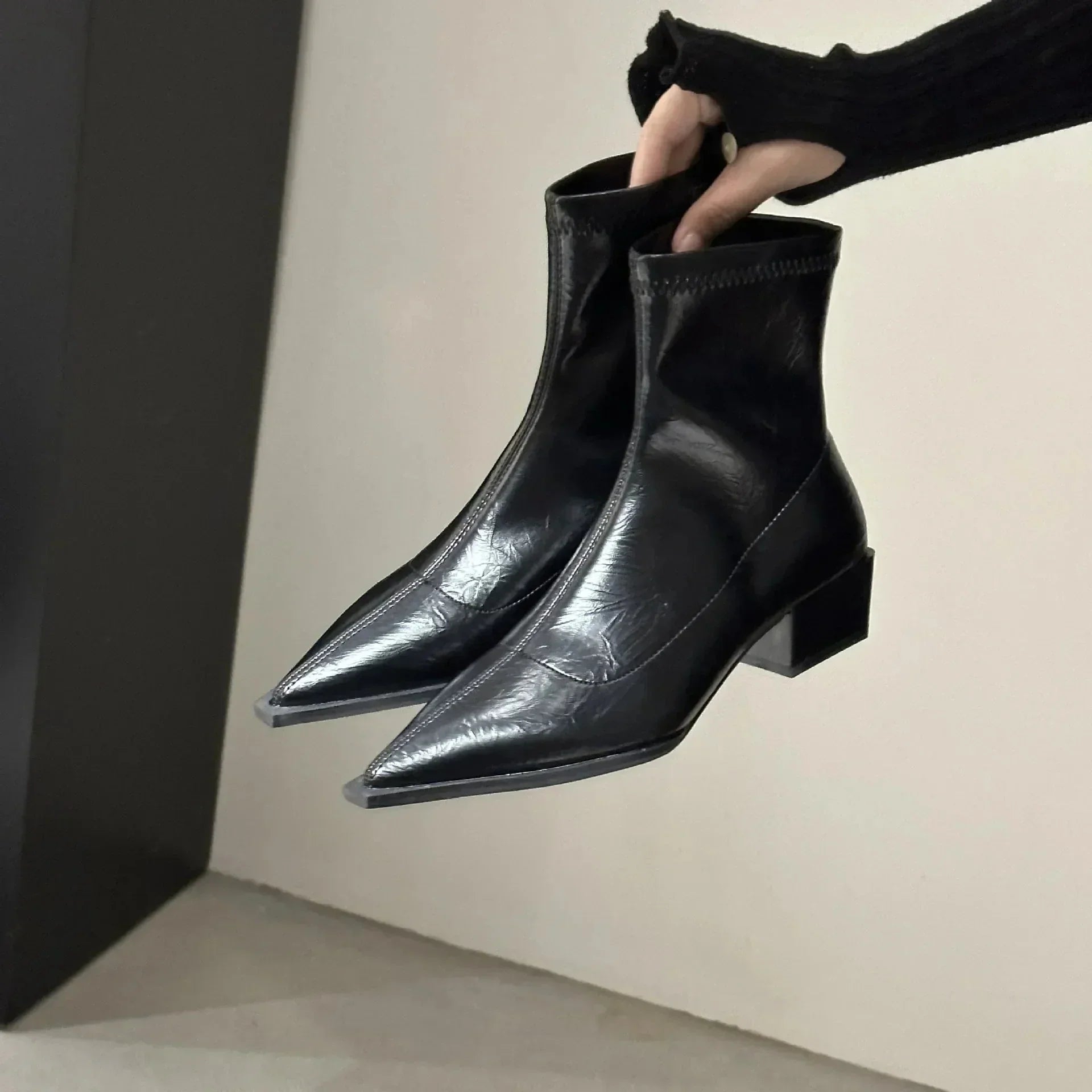Women's silver metallic pointed toe ankle boots with block heel, sleek day-to-night style