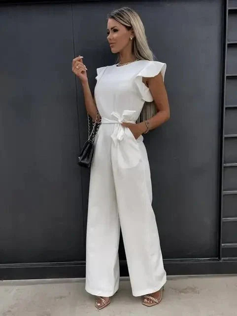 Women's wide-leg jumpsuit with ruched sleeves, belted waist, lightweight fabric, modern chic silhouette