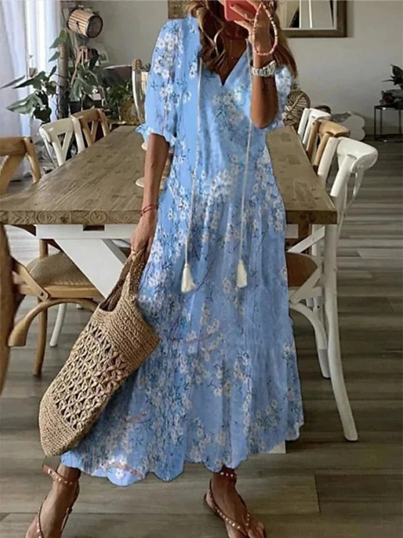 Women's lightweight floral maxi dress, loose V-neck fit in soft airy fabric, perfect breezy summer style