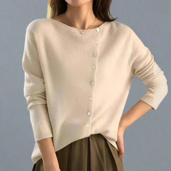 Women's asymmetrical button cardigan elegant layering piece with modern offset button detail
