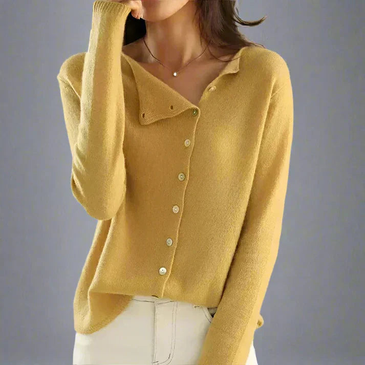 Women's asymmetrical button cardigan elegant layering piece with modern offset button detail