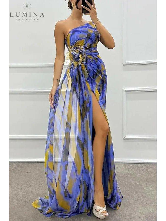 Vibrant printed maxi dress one-shoulder neckline side slit modern eveningwear silhouette