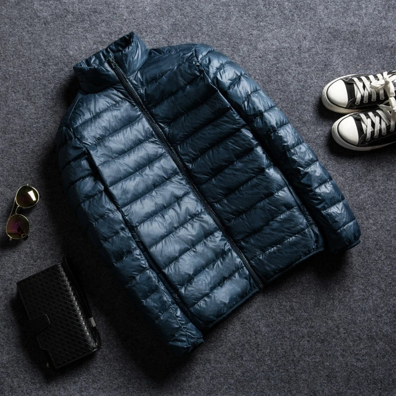 Men's lightweight packable puffer jacket water-resistant quilted design for outdoor winter adventures