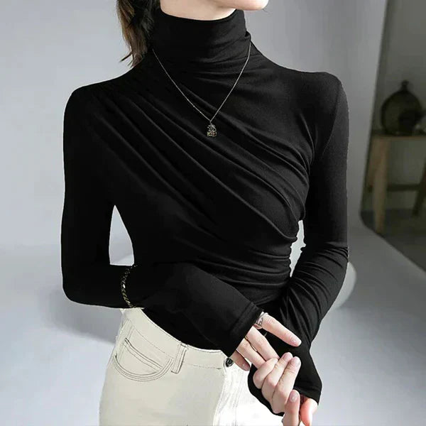 Beatrix white pleated turtleneck blouse elegant tailored fit with graceful draped silhouette