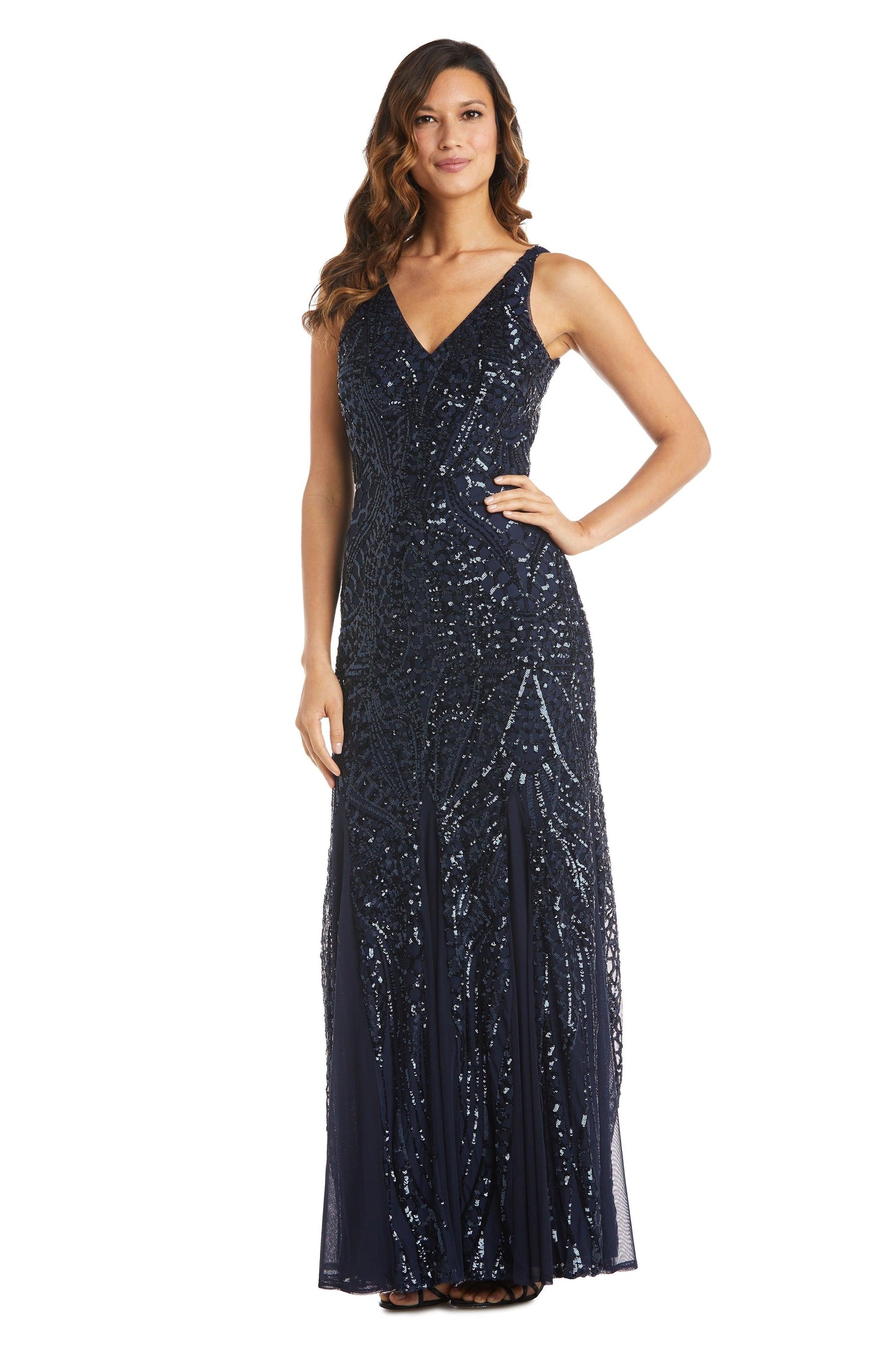 Petite sleeveless silver sequin formal gown with V-neck and sheer V-back insert