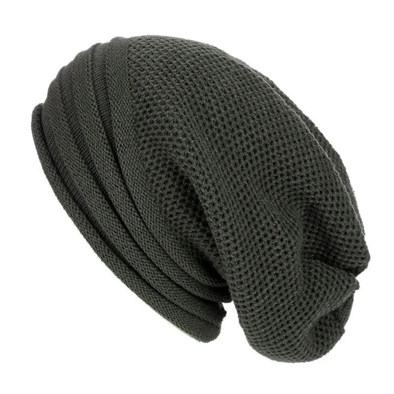 Women's oversized knitted beanie Nina cozy warm winter hat with stretch fit in neutral tone