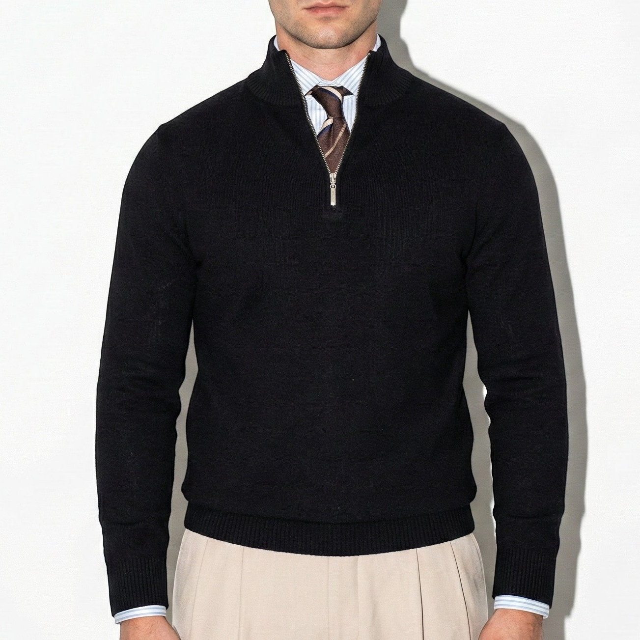 Men's wool half-zip high-collar sweater in neutral tone, calm knit texture for versatile winter layering