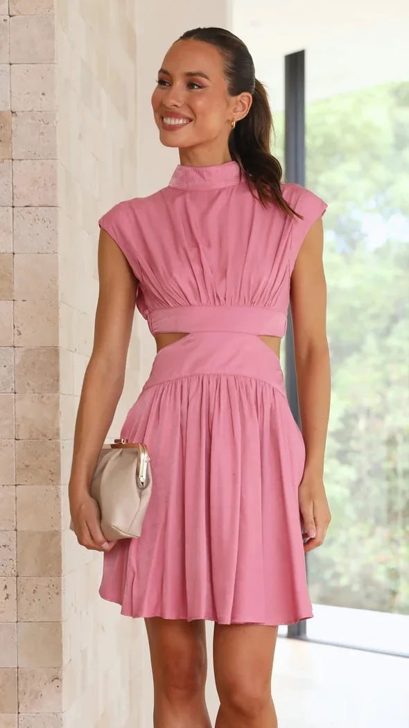 Sleeveless two-piece crop top and A-line mini skirt set high-neck high-waist modern chic outfit