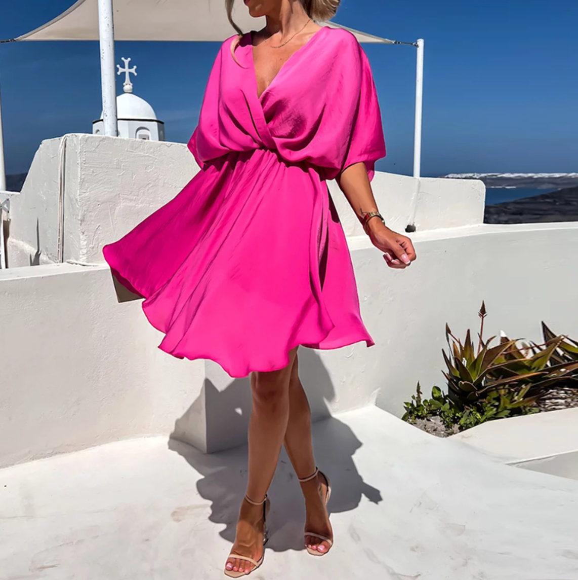 Women's wrap mini dress V-neck short dolman sleeves elasticized waist cinched silhouette effortless chic