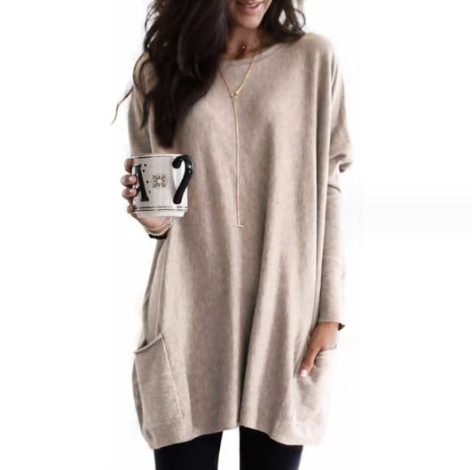 Women's long trench sweater in cozy knit with elongated structured silhouette and timeless elegance