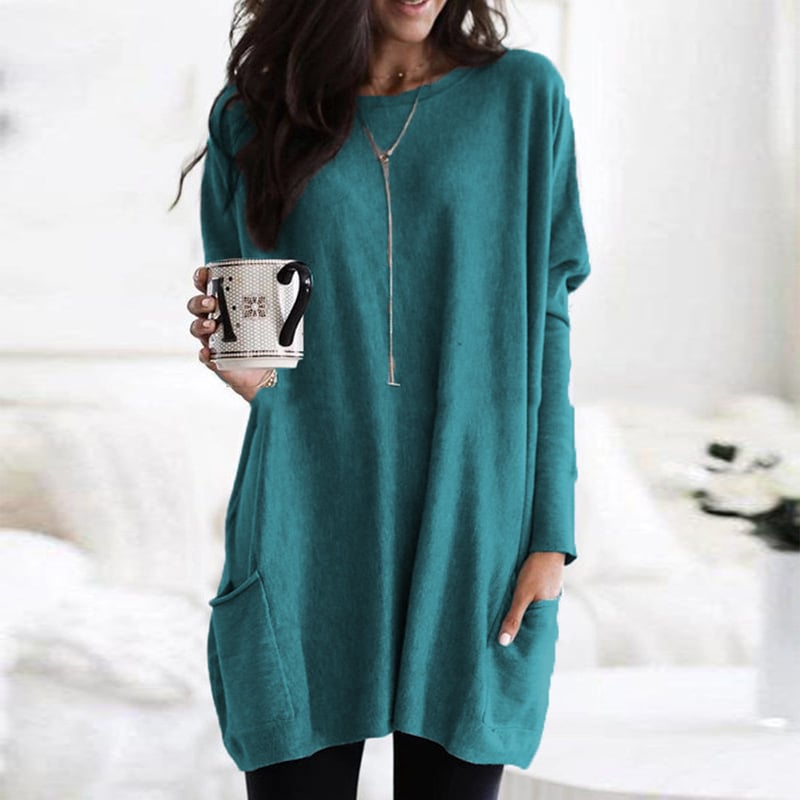 Women's long trench sweater neutral tone cozy knit elongated silhouette timeless winter layering piece