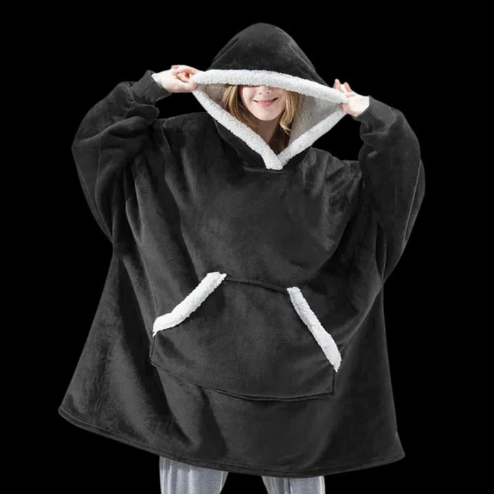 Oversized wearable blanket hoodie in plush fabric, ultra-cozy hooded design for home and outdoor lounging