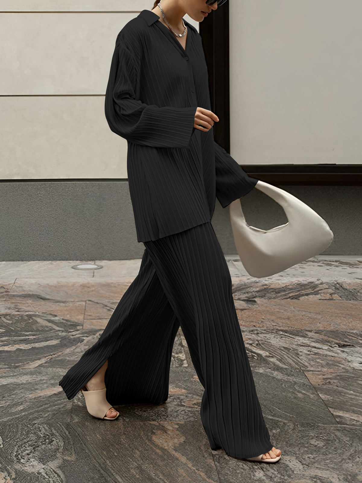 Women oversized two-piece pants set with pleated detailing, casual loose-fit loungewear coord