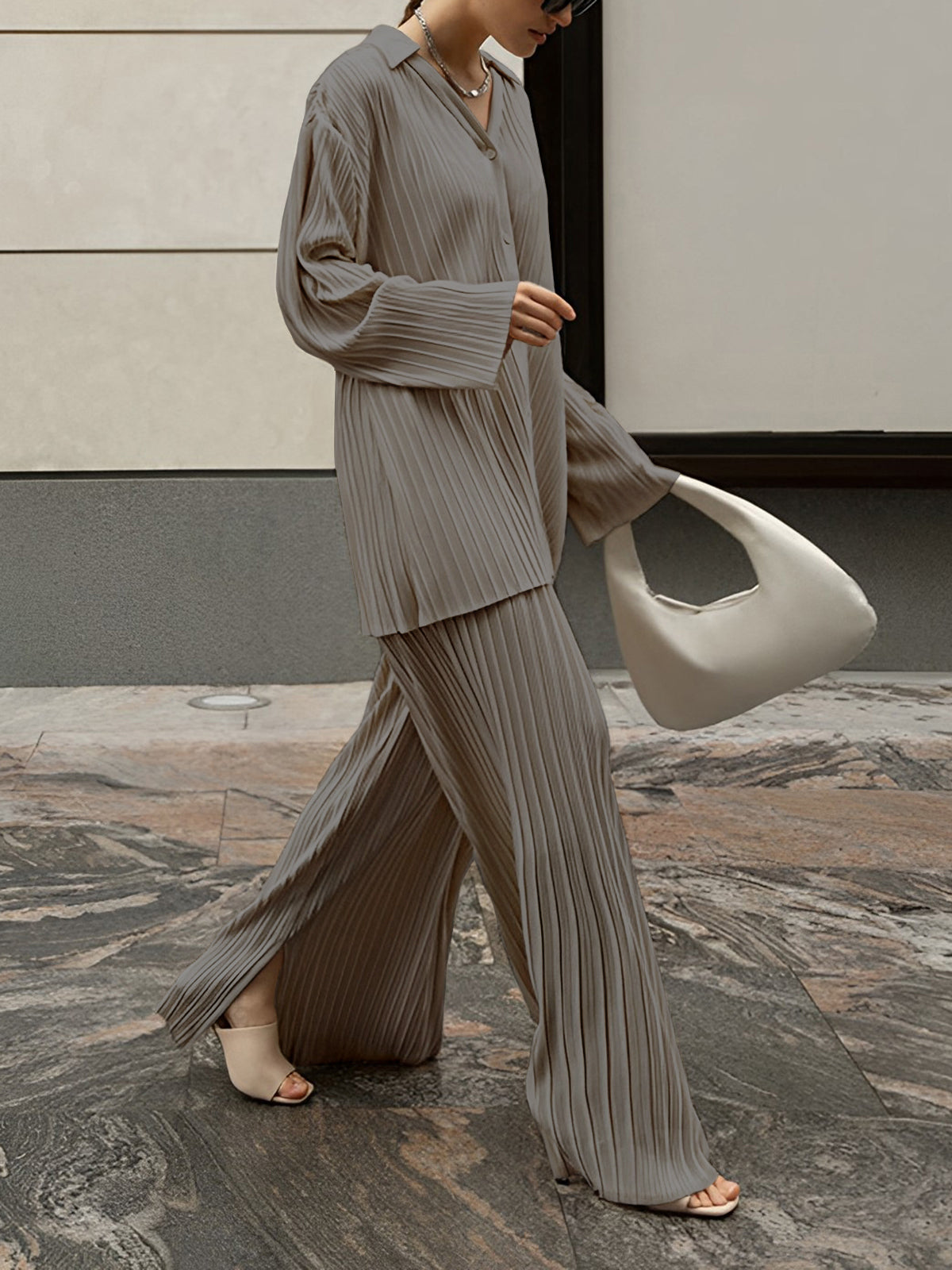 Women oversized two-piece pants set with pleated detailing, casual loungewear coord with pockets