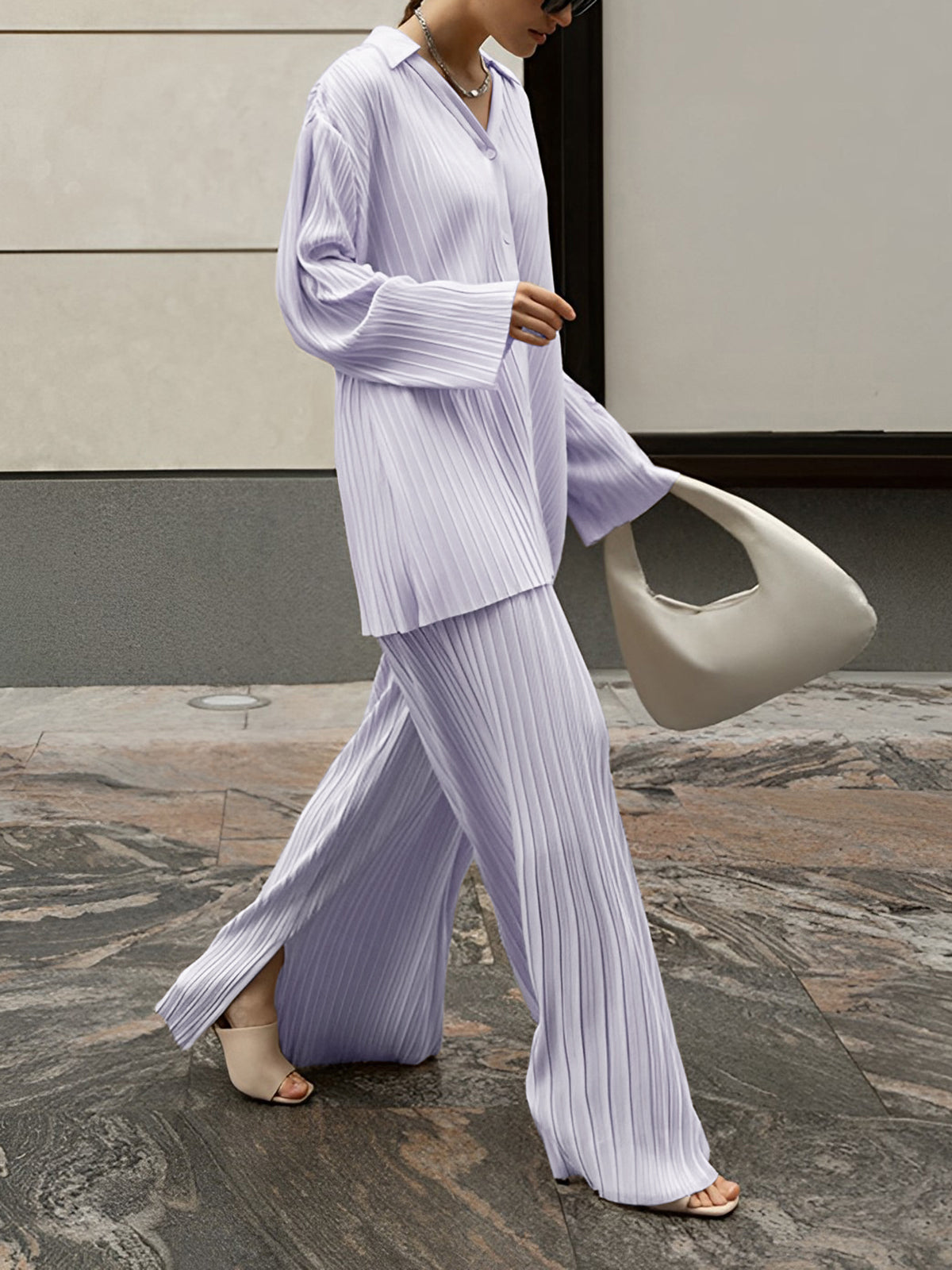Women oversized pleated two-piece pants set casual lounge style with pockets coordinated leisure outfit