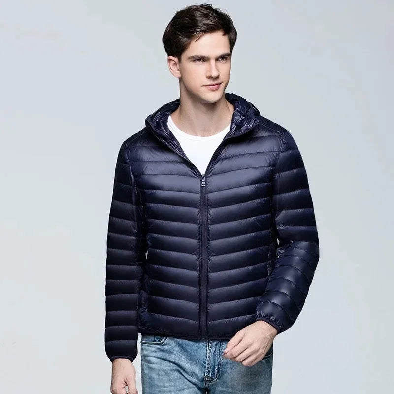 Men's ultralight packable hooded puffer jacket in neutral tone, slim winter travel layer