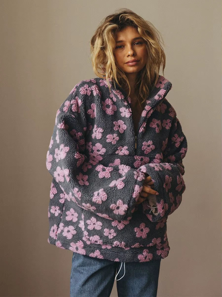 Women's oversized sherpa half-zip pullover in cream with bold retro floral print and cozy high-pile fleece