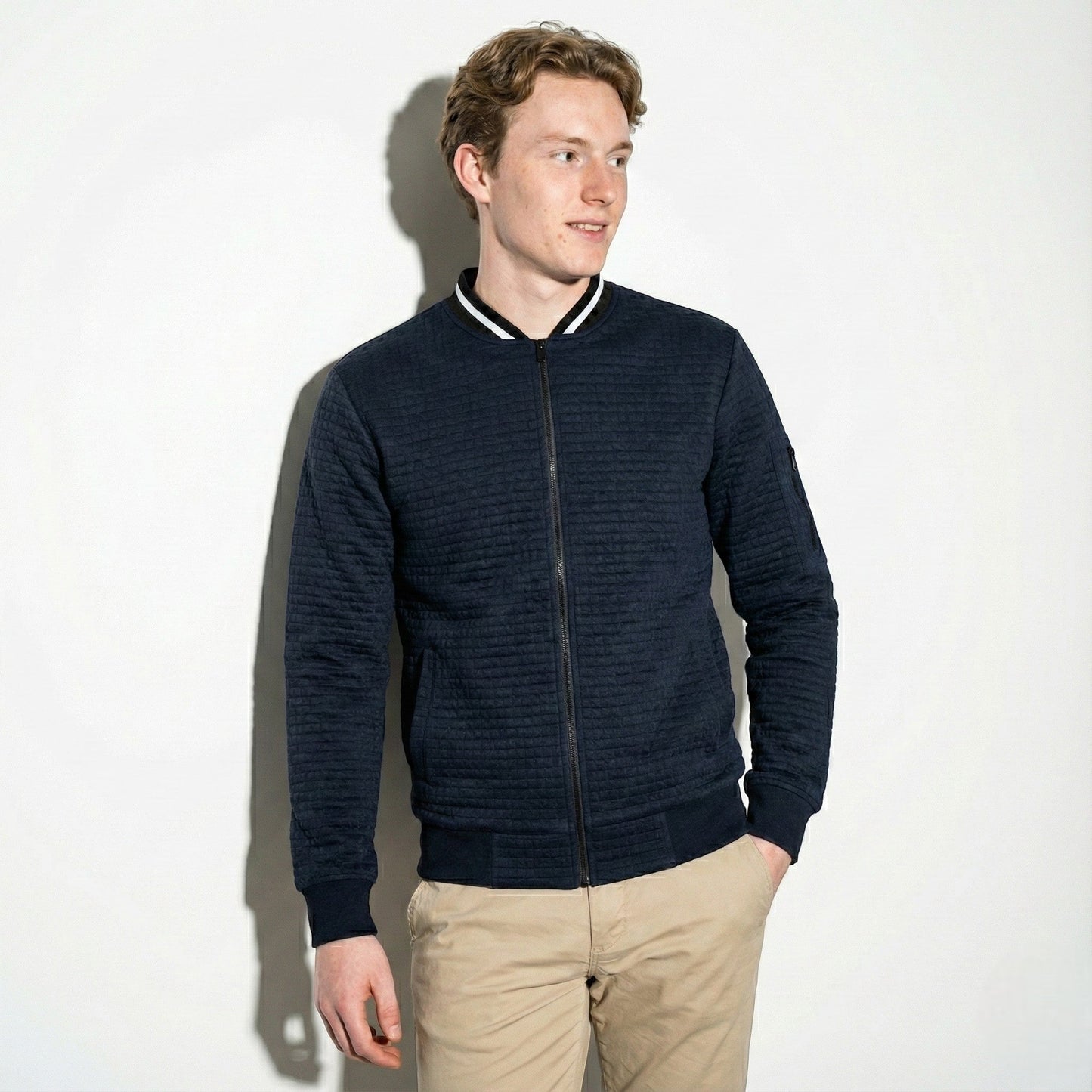 Men's navy textured cotton knit full-zip jacket with contrast collar for office and weekend wear