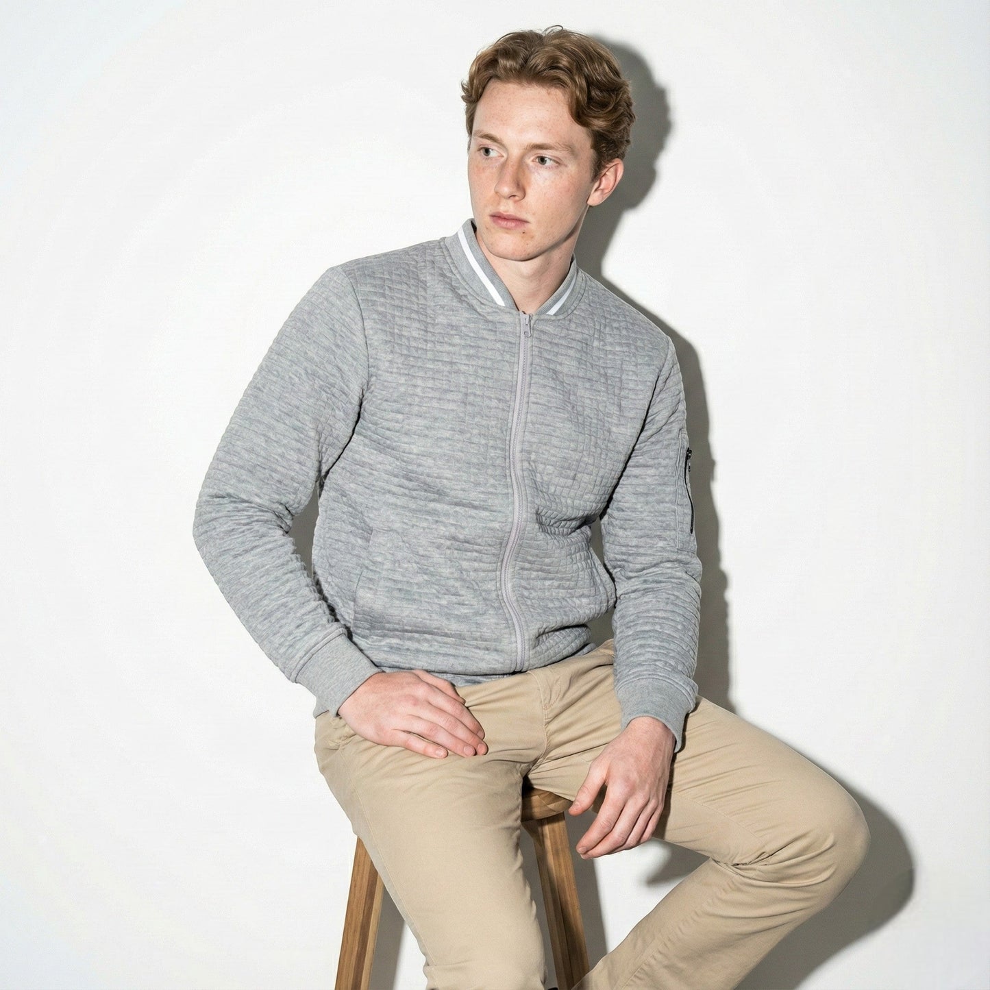Men's dark textured full-zip cotton knit jacket with contrast collar for office and weekend wear