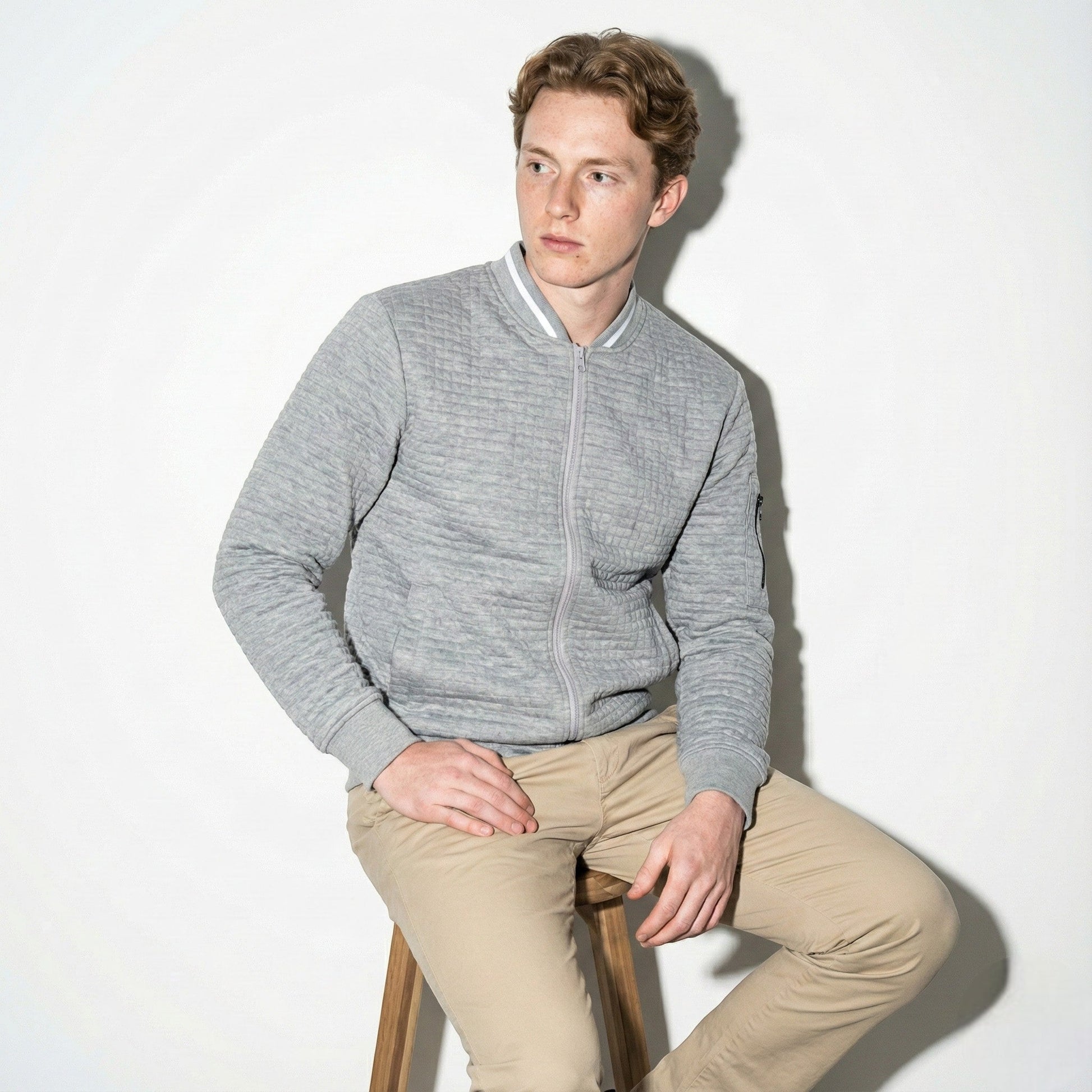 Men's dark textured full-zip cotton knit jacket with contrast collar for office and weekend wear